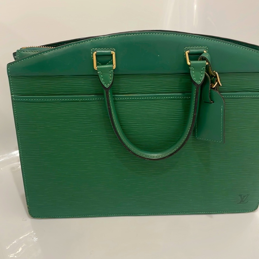 100% authentic Louis Vuitton.